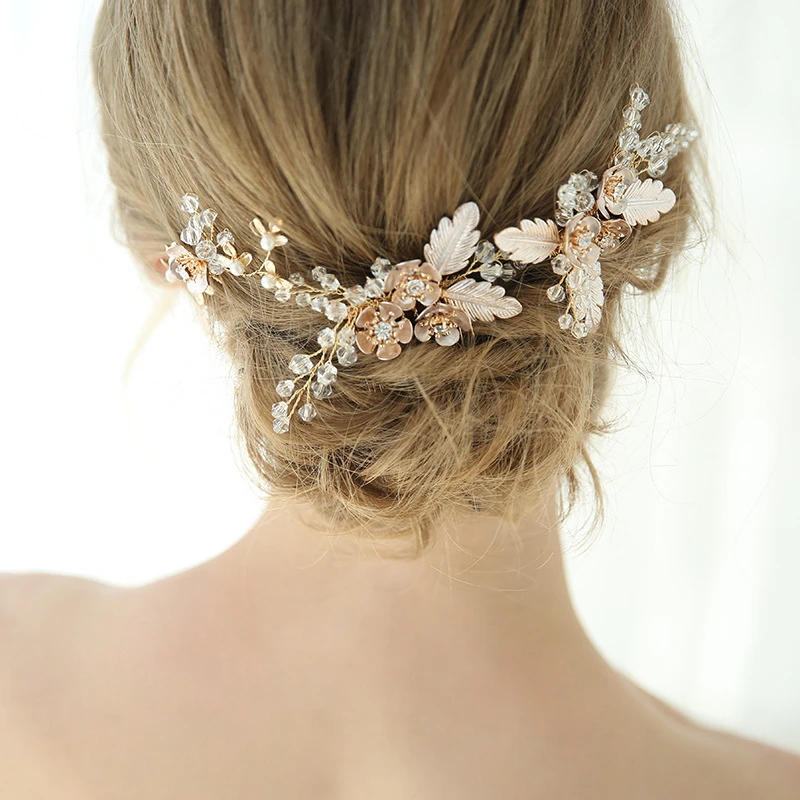A Pair of Original Hair Combs with Flowers and Leaves