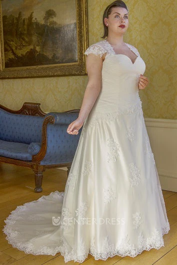 Cap Sleeve Lace Bridal Gown With Lace Up And Keyhole