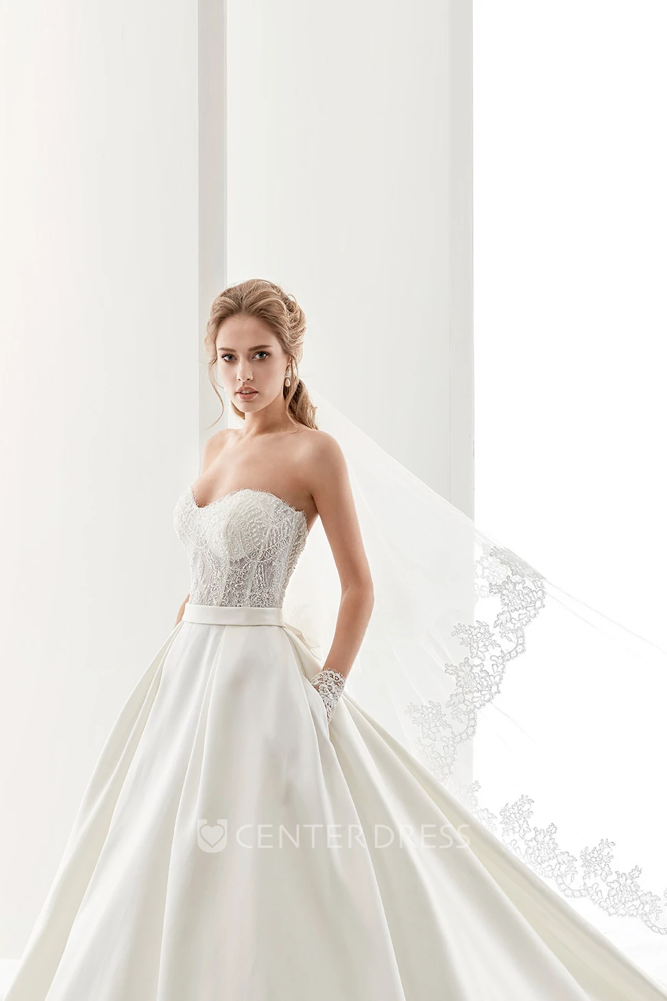 Sweetheart A-Line Satin Wedding Dress With Lace Bodice And Back Bow