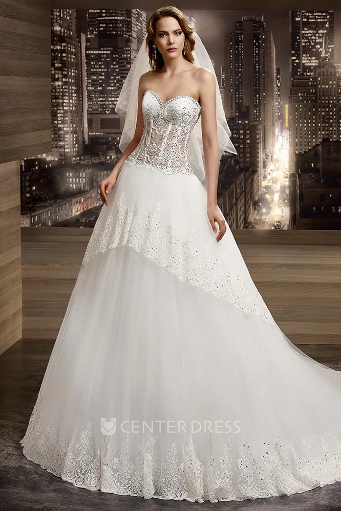 Sweetheart Illusion Beaded A-Line Bridal Gown With Peplum And Brush Train