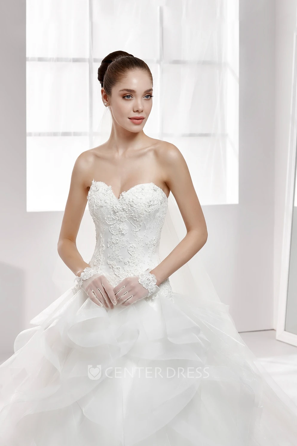 Sweetheart A-Line Wedding Gown With Cascading Ruffles and Lace Appliqued Corset