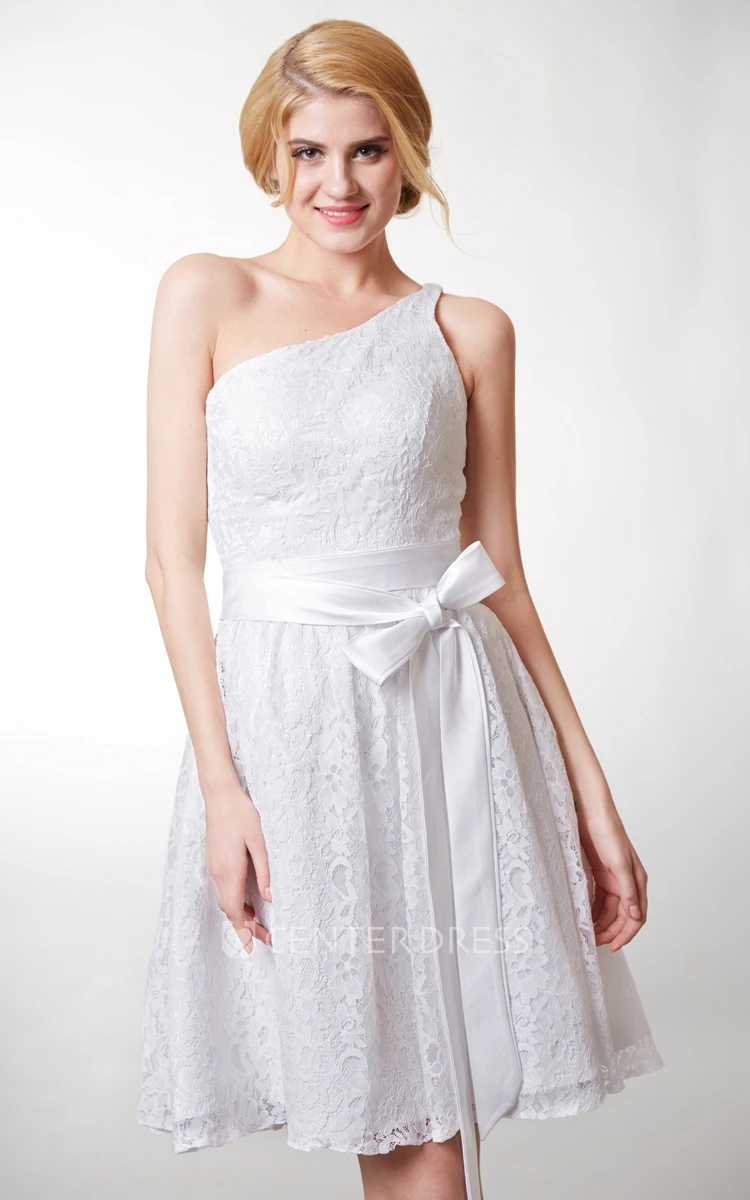 Beautiful Knee Length Lace Dress One Shoulder Neckline and Fitted Cut Flattering