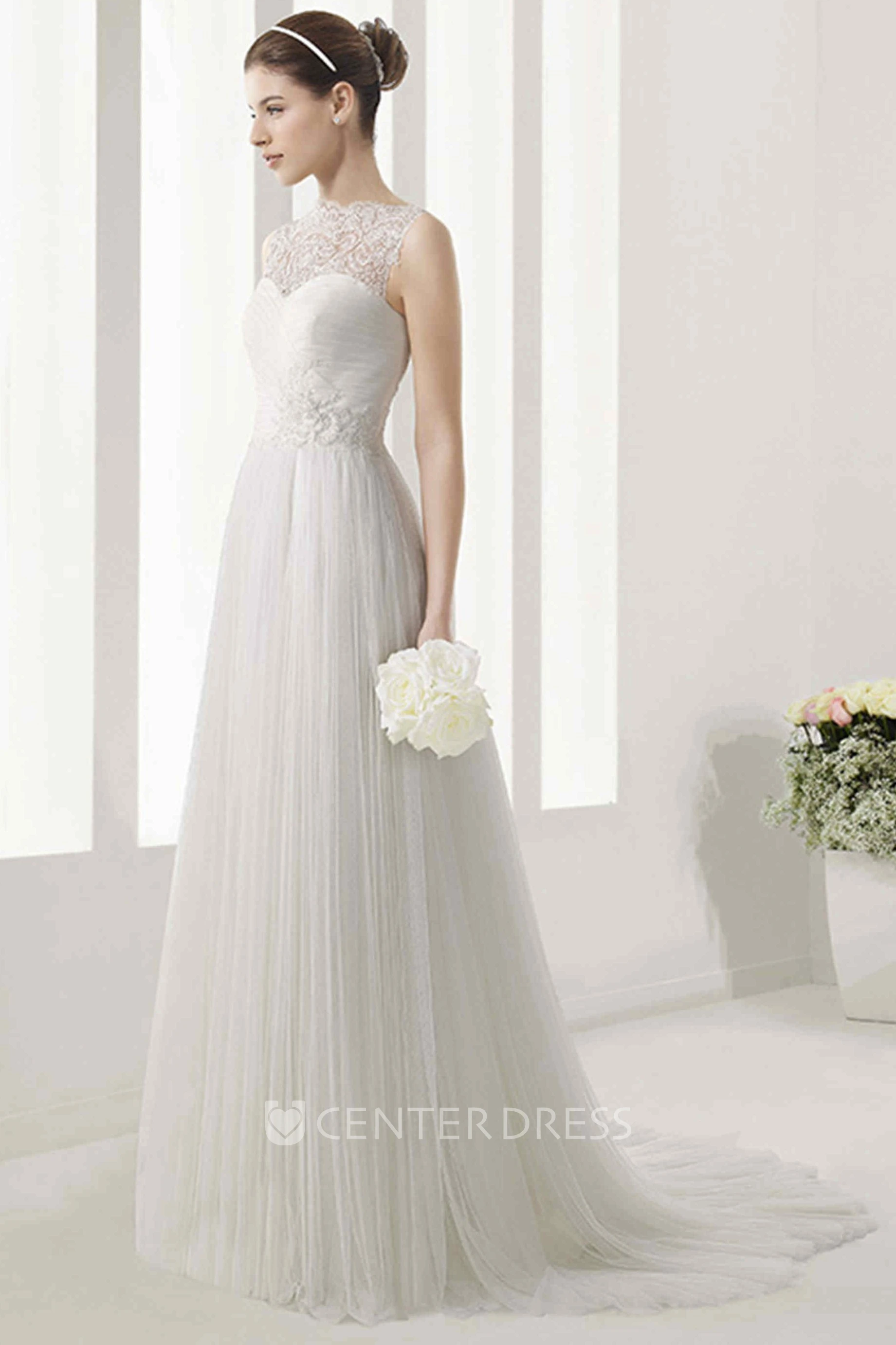 High Neck Sleeveless Tulle Gown With Lace Bodice And Pleated Skirt