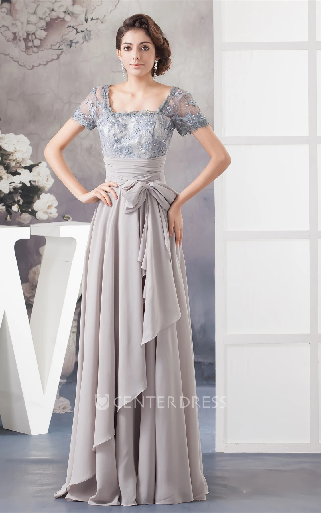 Chiffon Pleated Gown with Bow and Illusion Caped Sleeve