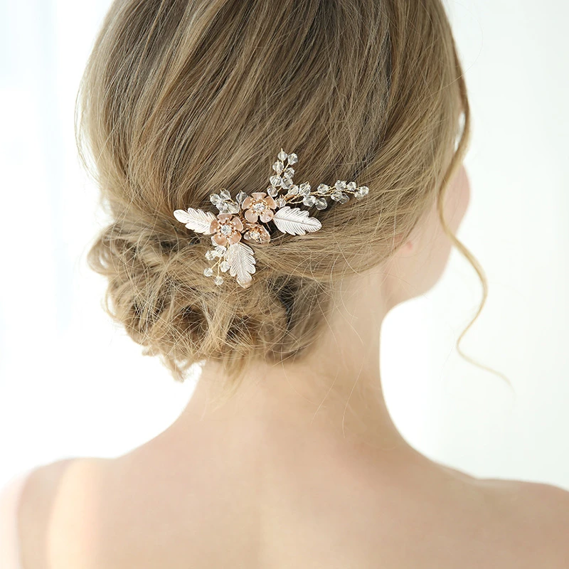A Pair of Original Hair Combs with Flowers and Leaves