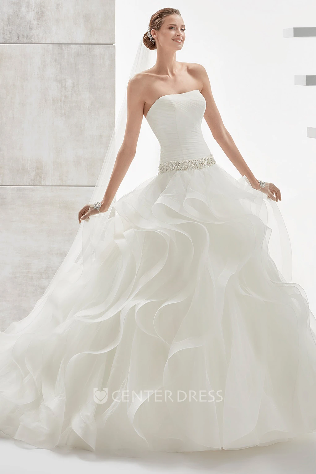 Strapless Pleating Wedding Dress with Cascading Ruffles and Beaded Details
