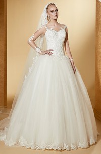 Elegant Long-Sleeve Ball Gown With Illusive Design And Lace Bodice