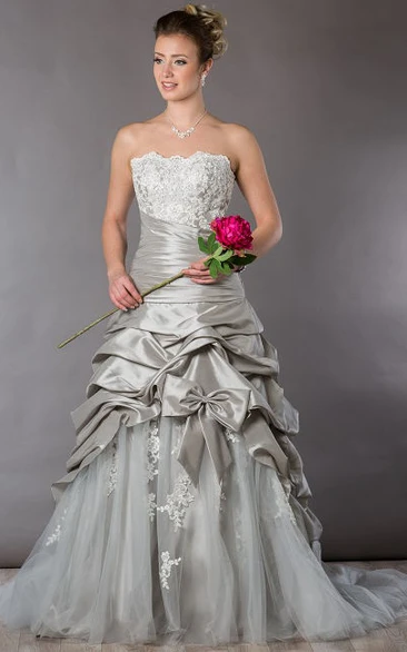 Strapless Appliqued Top Tulle Bridal Gown With Taffeta Ruffles And Bow