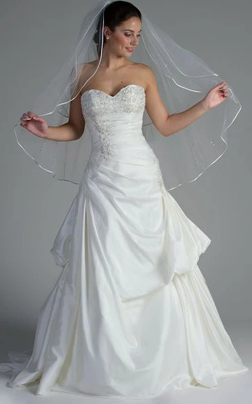 Appliqued Sweetheart Bodice Taffeta Bridal Gown With Ruffled Skirt