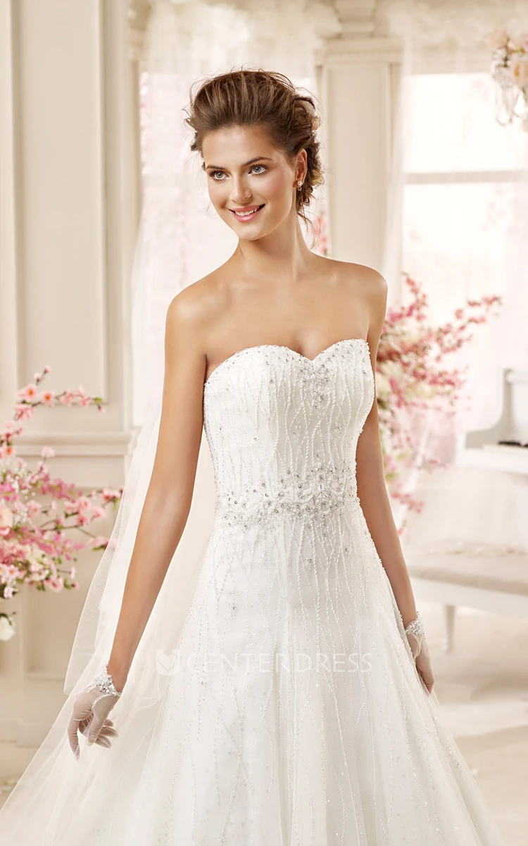 Sweetheart Beaded A-line Wedding Dress with Pleated Skirts and Lace-up Back