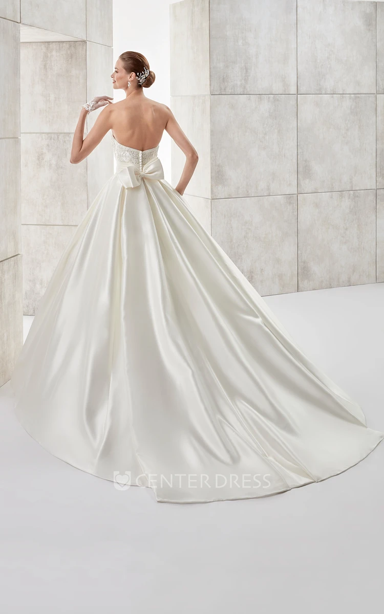 Strapless A-line Wedding gown with Cinched Waistband and Back Bow