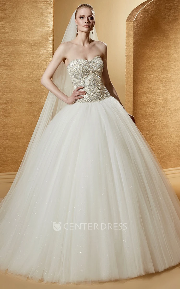 Chic Sleeveless Ball Gown With Beaded Corset And Open Back