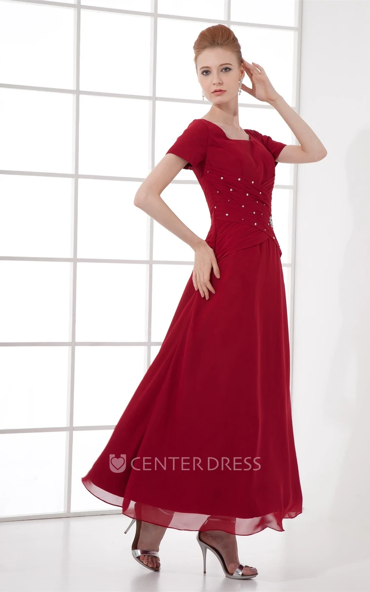 square-neck ankle-length short-sleeve dress with broach and ruching