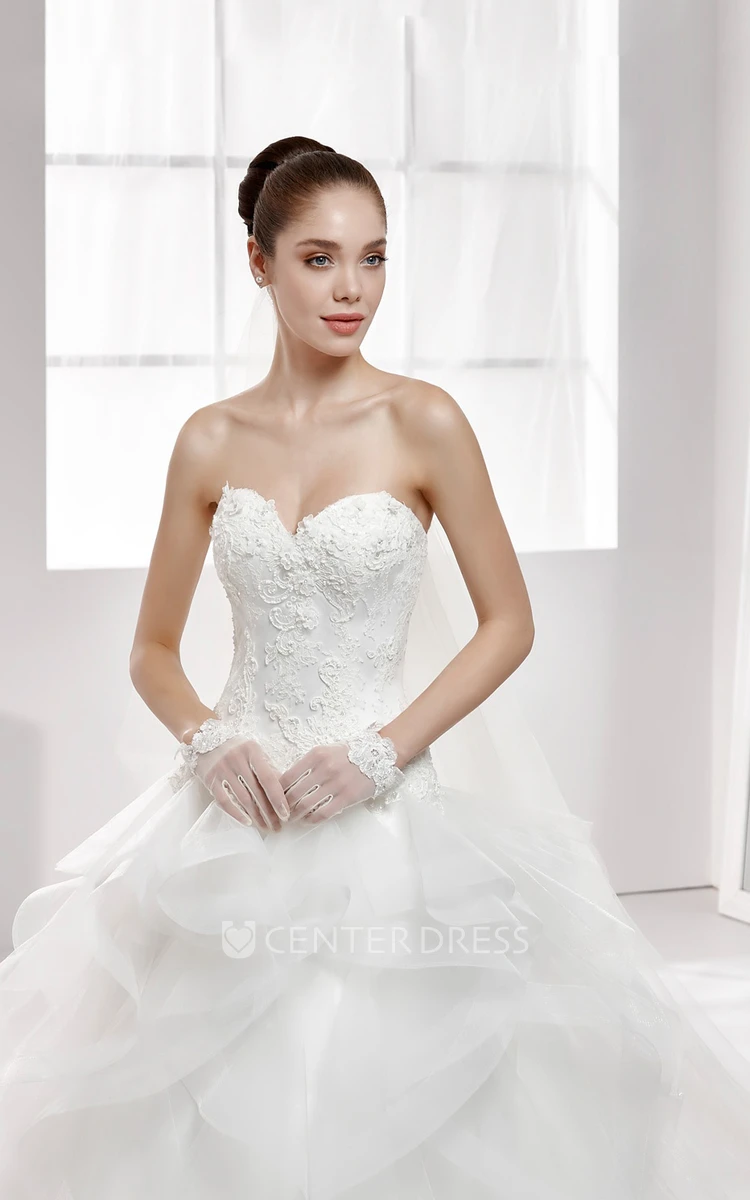 Sweetheart A-Line Wedding Gown With Cascading Ruffles and Lace Appliqued Corset