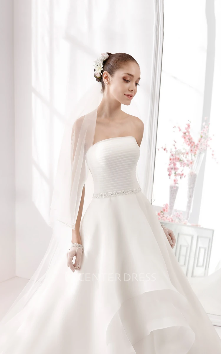 Strapless A-Line Wedding Gown With Pleated Bodice and Asymmetrically Ruffled Skirt