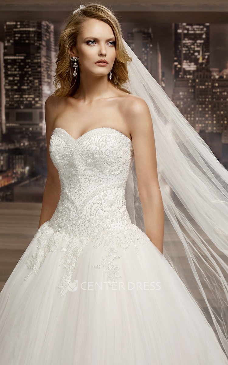 Sweetheart Appliqued Wedding Gown with Puffy Skirt and Beaded Corset