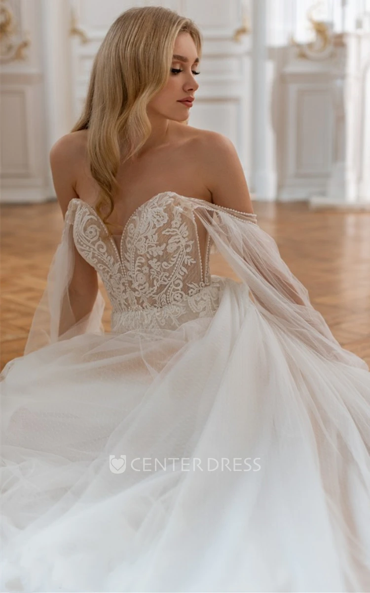 Charming A-Line Tulle Plunging Neck Wedding Dress with Appliques and Train