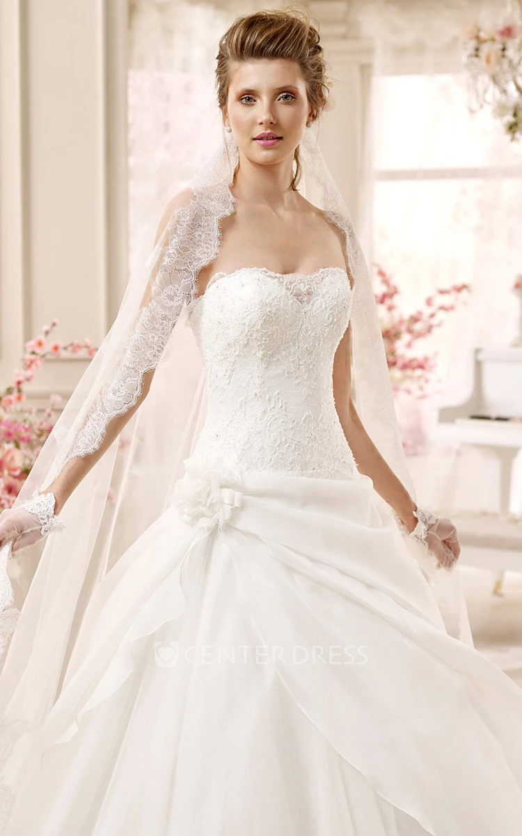 Strapless A-line Wedding Gown with Asymmetrical Overlayer and Flower