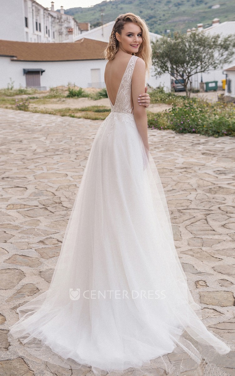 Deep v clearance tulle wedding dress